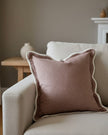 Dusty pink Chloe square scalloped cushion cover by Ellenvale Trade, soft furnishings with elegant scalloped edges.