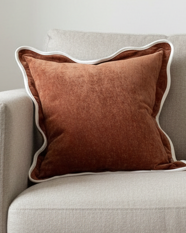 Rust brown and cream scalloped cushion cover by Ellenvale Trade, soft furnishings with decorative stitched edges.