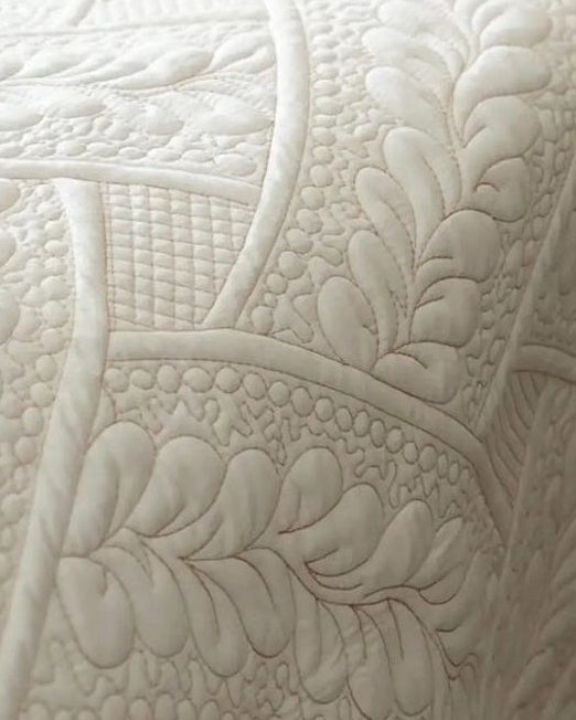 Cream luxury linen bed runner quilt from Ellenvale Trade, soft furnishings with elegant, smooth fabric and decorative edge detailing.