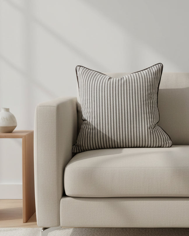 Dark brown and white pinstripe cushion cover with piped edges, made from luxury cotton blend, by Ellenvale Trade.