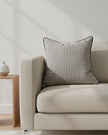 Dark brown and white pinstripe cushion cover with piped edges, made from luxury cotton blend, by Ellenvale Trade.
