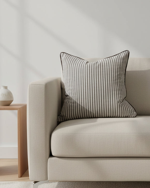 Dark brown and white pinstripe cushion cover with piped edges, made from luxury cotton blend, by Ellenvale Trade.