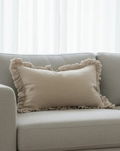 Hallie beige rectangle linen cushion cover with ruffled edges, soft furnishings by Ellenvale Trade, stylish and textured home decor accessory.