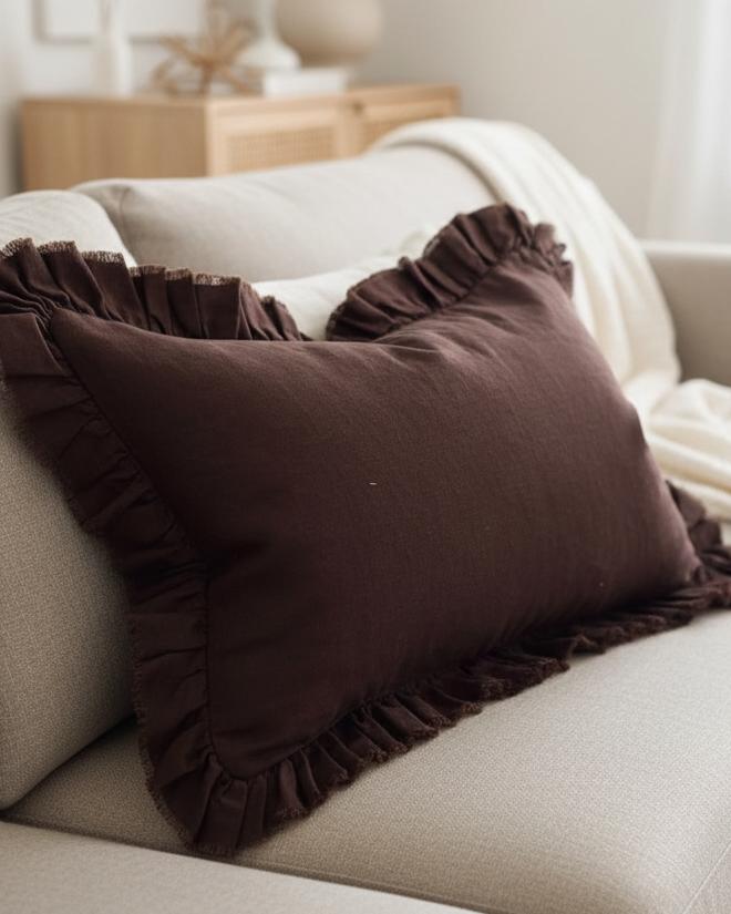 Dark brown linen blend cushion cover with ruffle edges, rectangular shape, from Ellenvale Trade's Hallie soft furnishings collection.