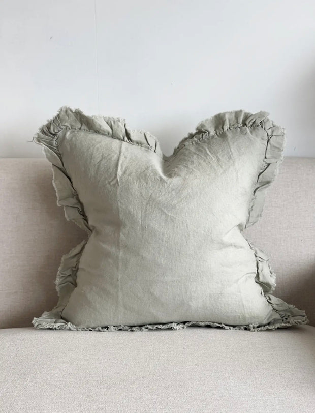 Sage green linen cushion cover with ruffled edges from Ellenvale Trade, designed for soft furnishings, 45cm x 45cm size.