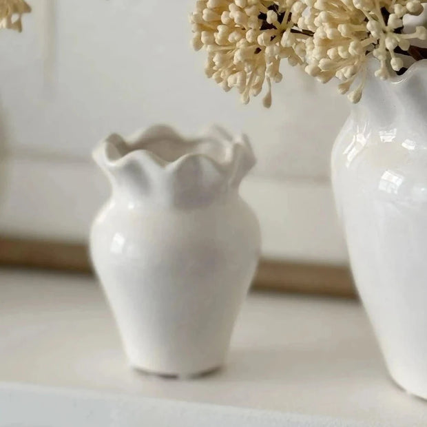 White Evelina Small Vase by Wikholmform, showcasing a sleek, modern ceramic design perfect for tabletop decor.