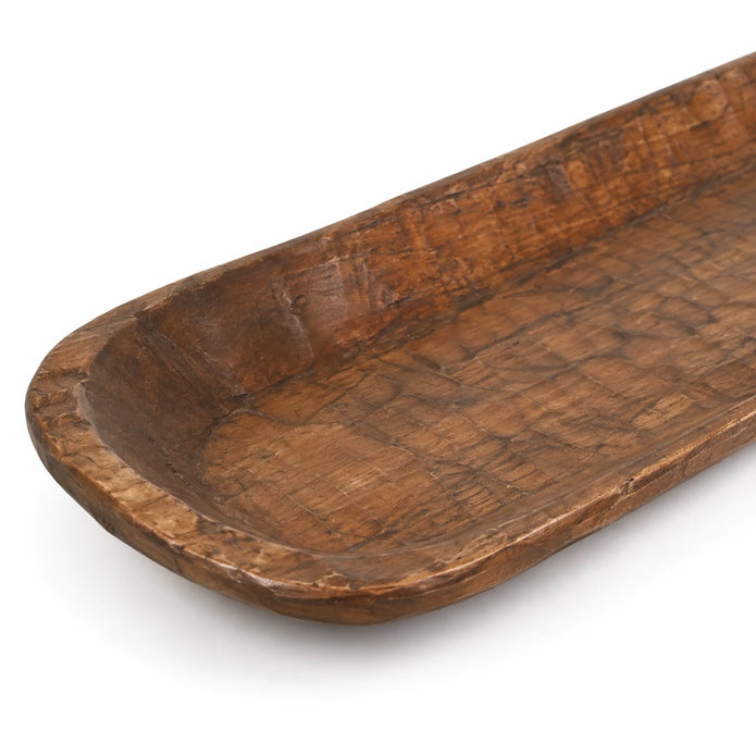 Close-up of the extra-large rustic dough bowl’s rounded end, worn rim and hand-carved texture.