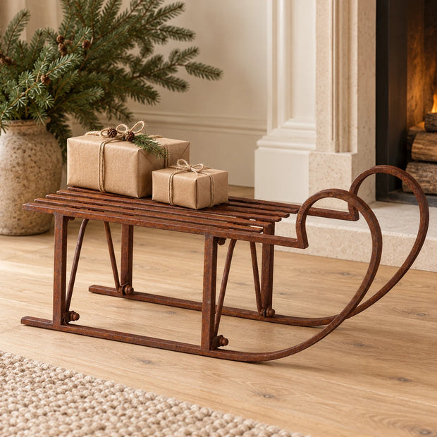 Extra Large Rustic Metal Christmas Sleigh Decoration — Single sleigh on light oak floor beside cream fireplace