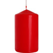 Red pillar candle 60x100mm from Ancient Wisdom, showing a smooth cylindrical shape with warm, vibrant red wax.