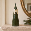 Satchville large forest green striped ceramic Christmas tree with bow displayed on a mantelpiece