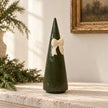 Satchville medium forest green striped ceramic Christmas tree with bow displayed on a mantelpiece
