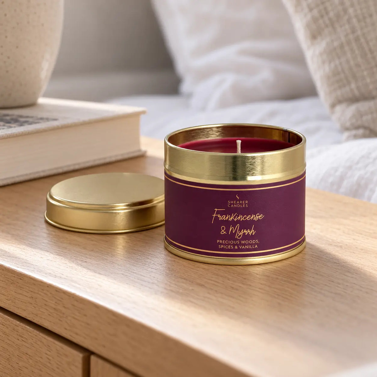 Small tin candle with frankincense and myrrh scent, ideal for Christmas decor, by Shearer Candles.