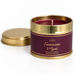 Small tin candle from Shearer Candles with Frankincense and Myrrh scent, featuring festive Christmas packaging.