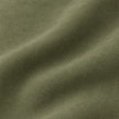 Frayed Edge Olive Green Cushion Cover, close-up of the plain olive fabric and fine woven texture.