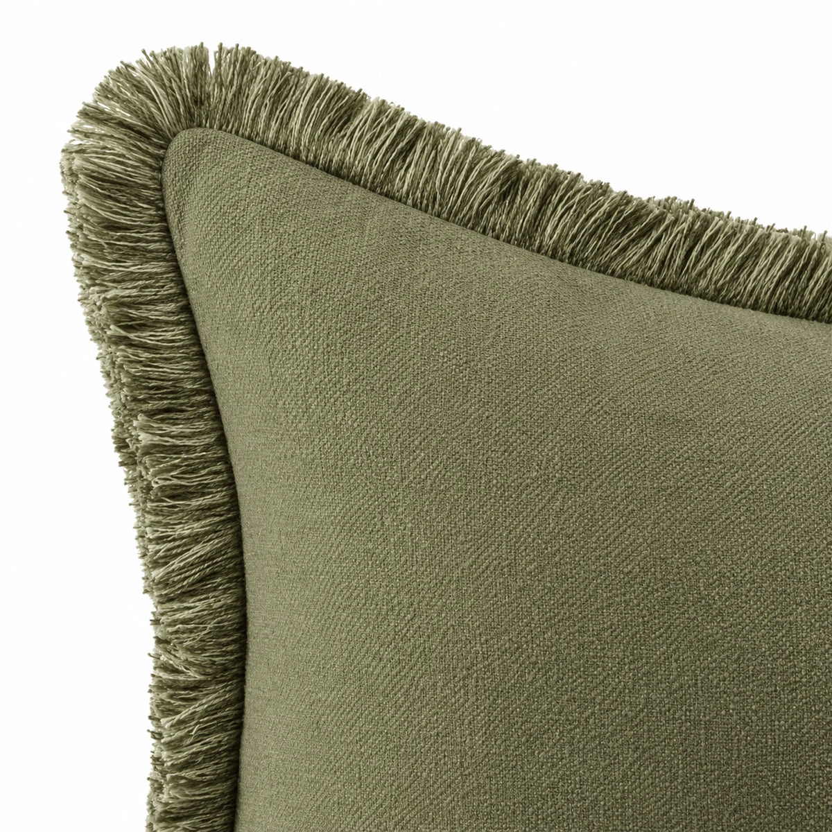 Frayed Edge Olive Green Cushion Cover, close-up of the fringed corner and stitched edge against white.