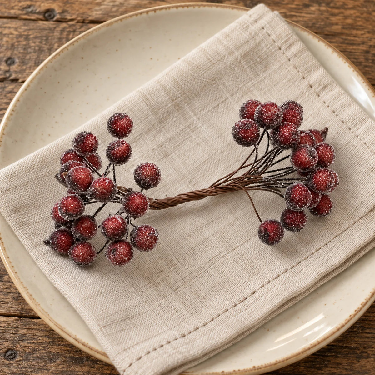 Frosted berry mini stem on a linen napkin and ceramic plate