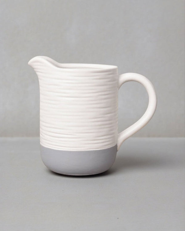 White and grey ceramic jug from Gainsborough Giftware, ideal for home décor with a sleek, modern design.