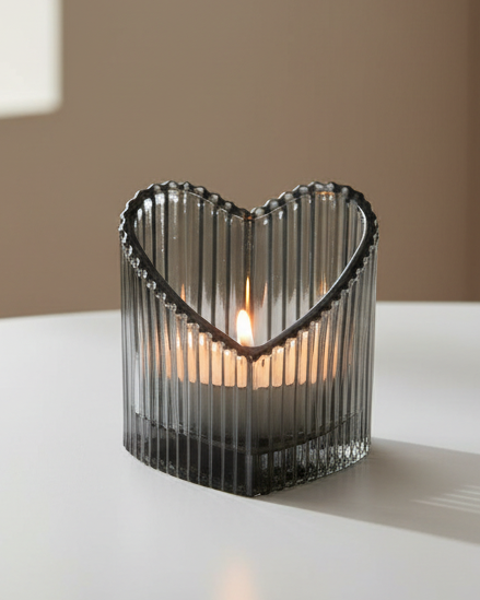 Grey ribbed heart-shaped tealight holder from Gainsborough Giftware's Spring collection, perfect for cozy ambiance.