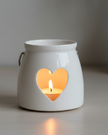 White ceramic heart-shaped tealight candle holder from Gainsborough Giftware, perfect for spring decor.