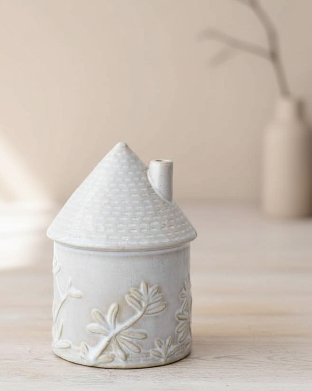 White ceramic round house with flower detailing, perfect for spring decor by Gainsborough Giftware.