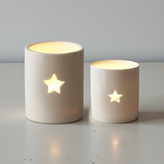 White ceramic star-shaped tealight candle holder from Gainsborough Giftware's spring collection, perfect for cozy decor.