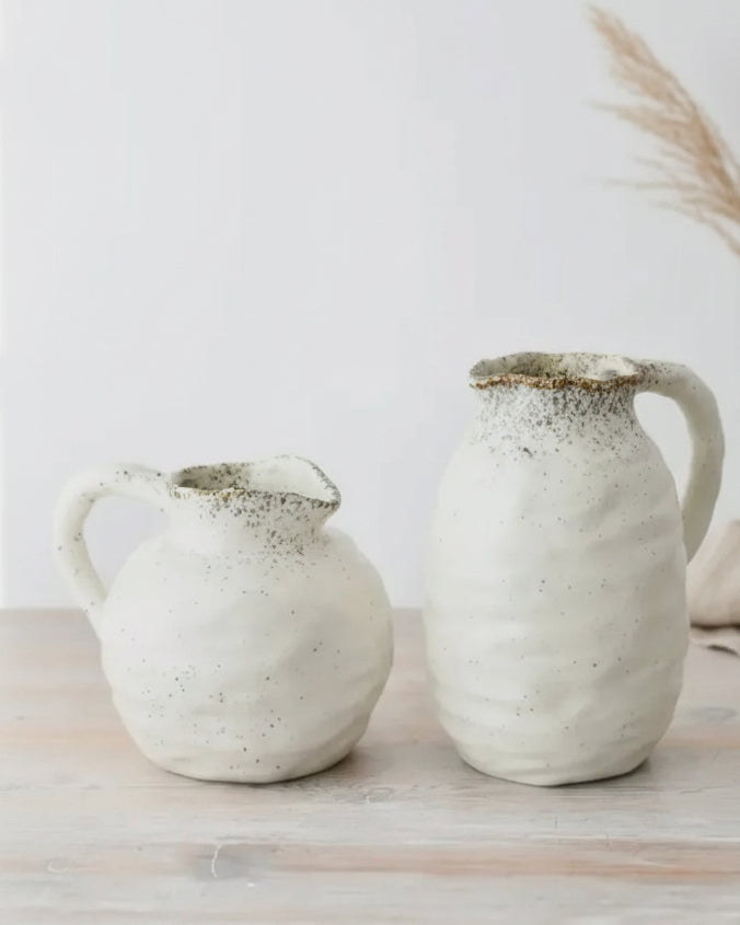 Natural Cream Beba speckled ceramic jug vase by Gainsborough Giftware, with a rustic, textured finish and classic jug shape.