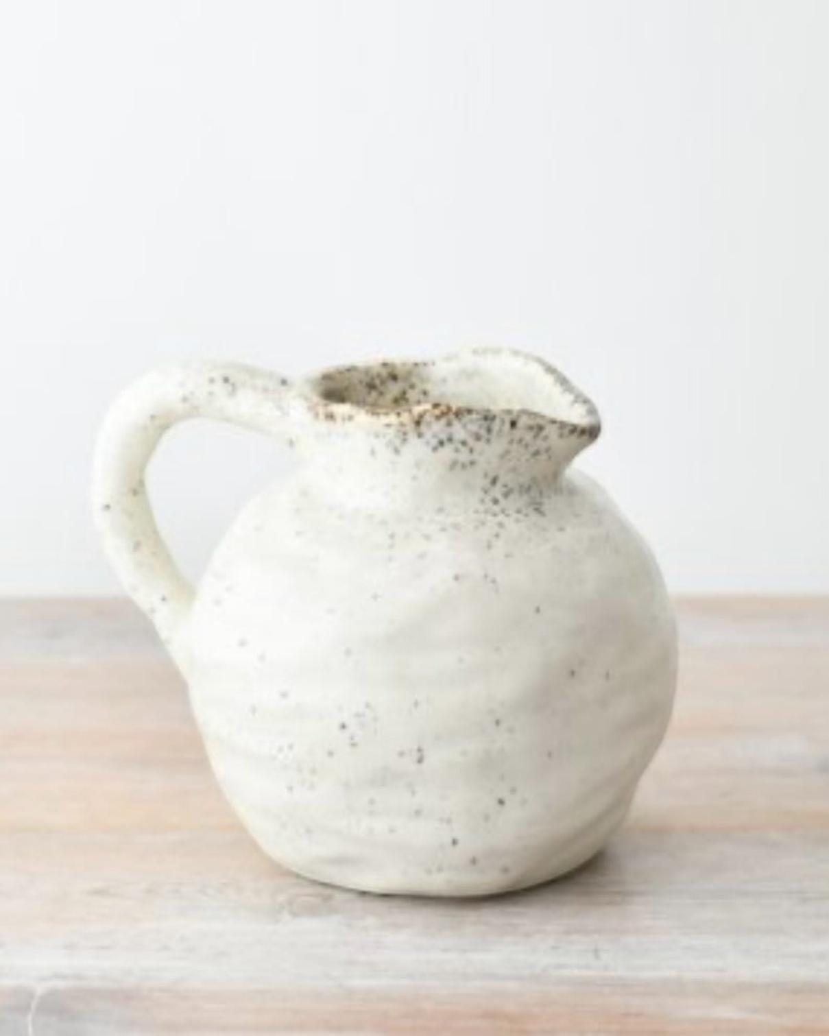 Natural Cream Beba speckled ceramic jug vase by Gainsborough Giftware, with a rounded shape and textured speckled finish.