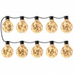 Ten Galaxy Firefly festoon bulbs with warm lights and black cable arranged against white.