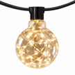 Single clear Galaxy Firefly festoon bulb showing the warm light wire inside.
