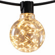 Close-up of warm light wires inside a clear Galaxy Firefly festoon bulb.