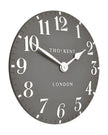 Thomas Kent 12-inch Arabic wall clock in dolphin grey, showcasing a sleek, modern design with clear Arabic numerals.