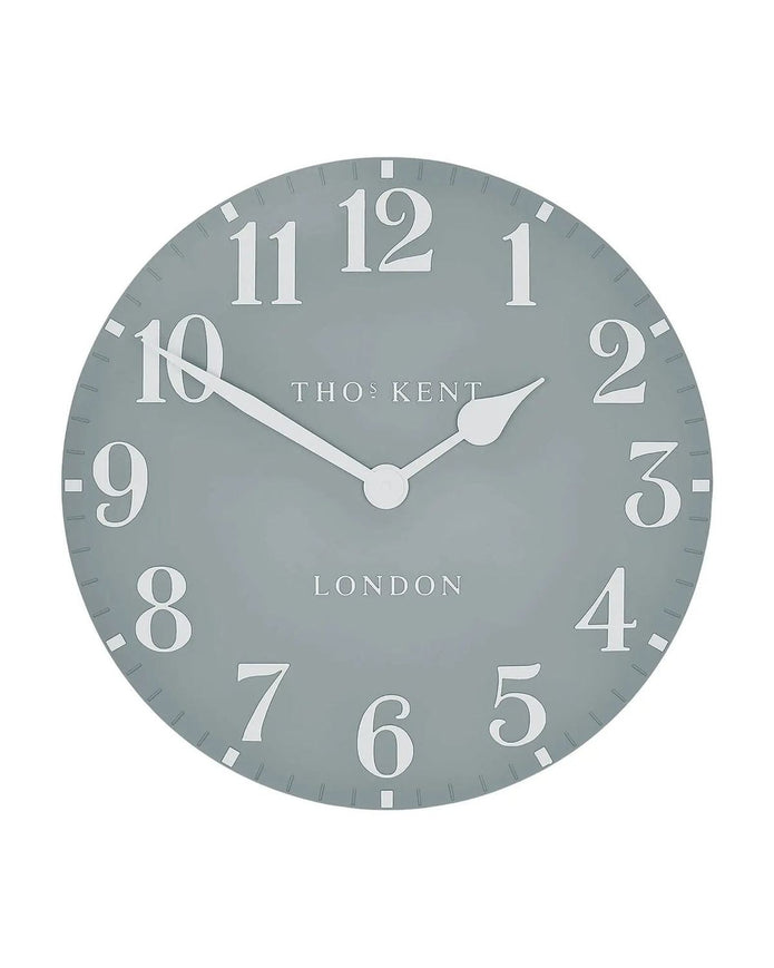 Thomas Kent 12-inch Arabic wall clock in flax blue featuring bold black Arabic numerals and a classic round design.