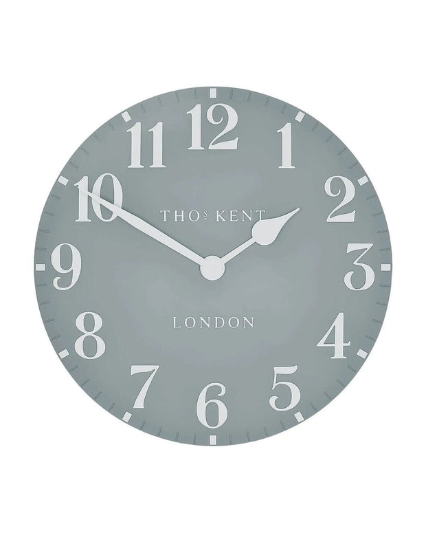 Thomas Kent 12-inch Arabic wall clock in flax blue featuring bold black Arabic numerals and a classic round design.