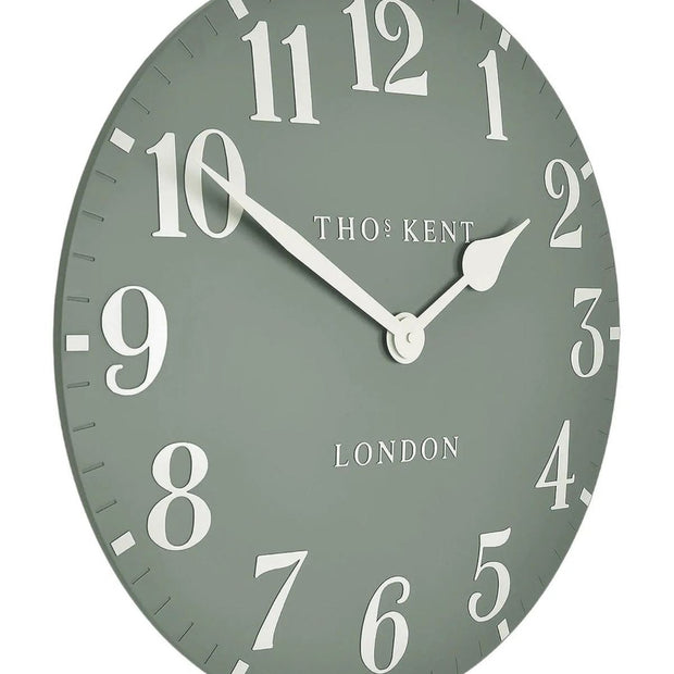 Thomas Kent 12-inch Arabic wall clock by Gallery Direct in Seagrass Green, featuring bold Arabic numerals and a modern design.
