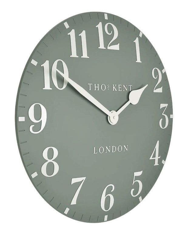 Thomas Kent 12-inch Arabic wall clock by Gallery Direct in Seagrass Green, featuring bold Arabic numerals and a modern design.
