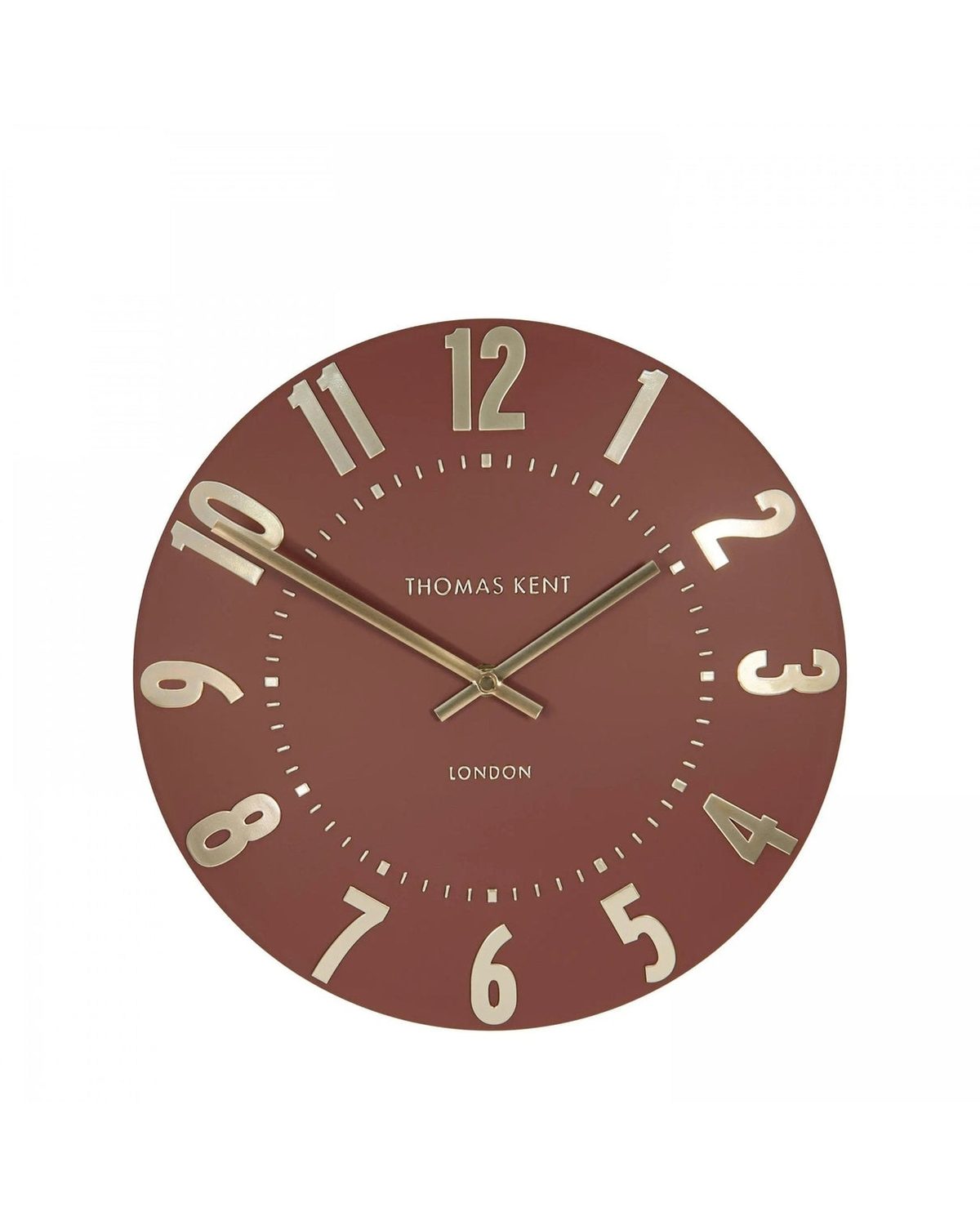 Thomas Kent 12-inch Mulberry wall clock by Gallery Direct, featuring a terracotta-colored round clock with black hands.