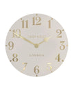 Thomas Kent 20-inch Arabic wall clock by Gallery Direct in oatmeal white with black Arabic numerals and a sleek modern design.