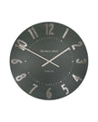 Thomas Kent 20-inch Mulberry wall clock in olive green, showcasing a stylish round clock with bold black hands.