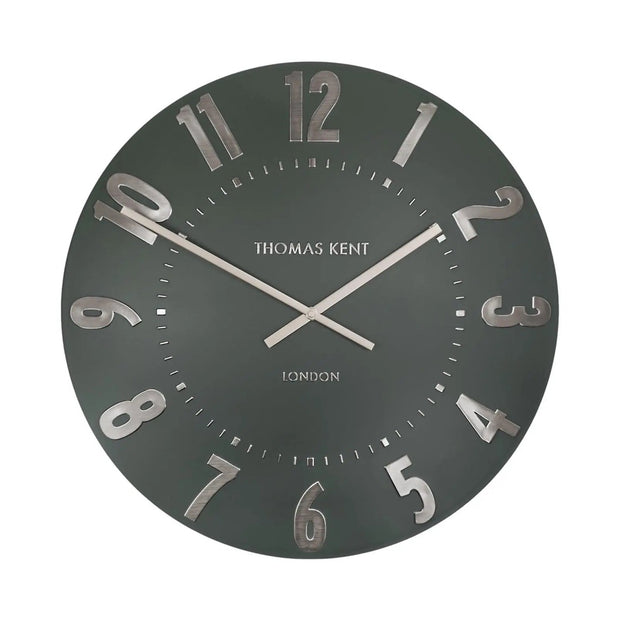 Thomas Kent 20-inch Mulberry wall clock in olive green, showcasing a stylish round clock with bold black hands.