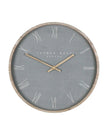 Thomas Kent 21-inch Nordic wall clock in cement grey with a minimalist design, suitable for modern home decor.