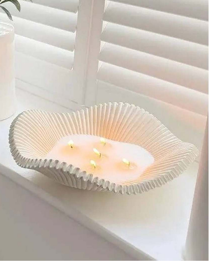 Large scalloped wavy decorative bowl by Gallery Direct, perfect for home decor, featuring a stylish, artistic design.