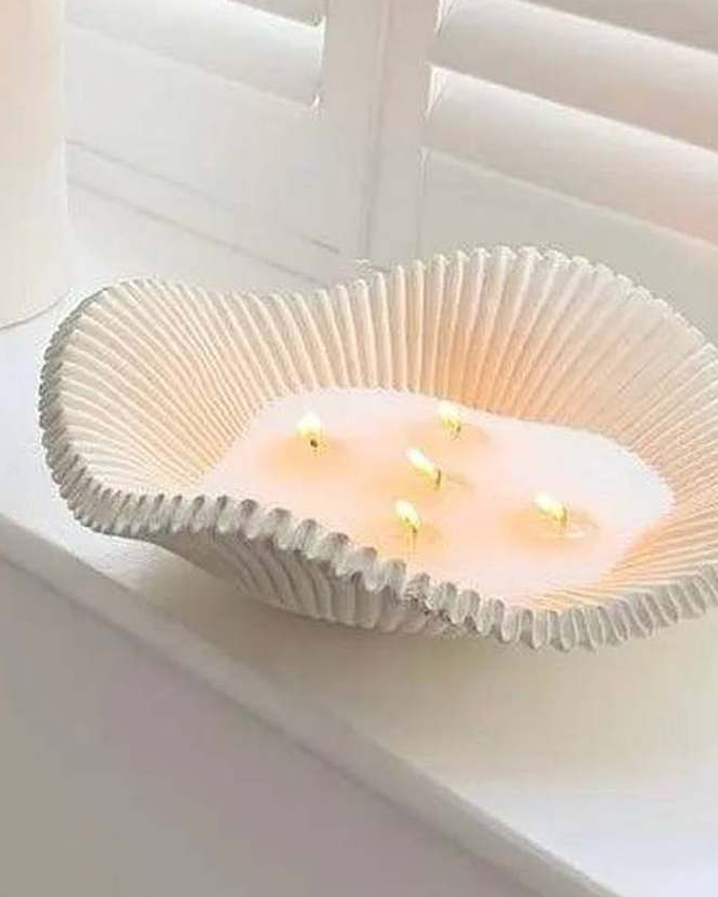 Large scalloped wavy decorative bowl by Gallery Direct, ideal for stylish home decor displays.