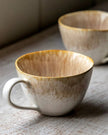 Beige reactive glaze organic ombre mug for kitchen and dining by Gallery Direct, showcasing a stylish, handcrafted ceramic design.