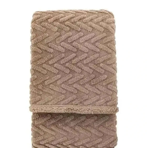 Neutral taupe brown herringbone Sherpa blanket throw from Gallery Direct, showcasing soft, cozy textured fabric.