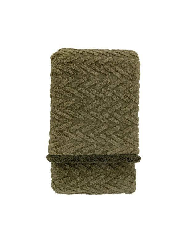 Sage green herringbone sherpa blanket throw from Gallery Direct, showcasing soft, cozy fabric with a stylish herringbone pattern.