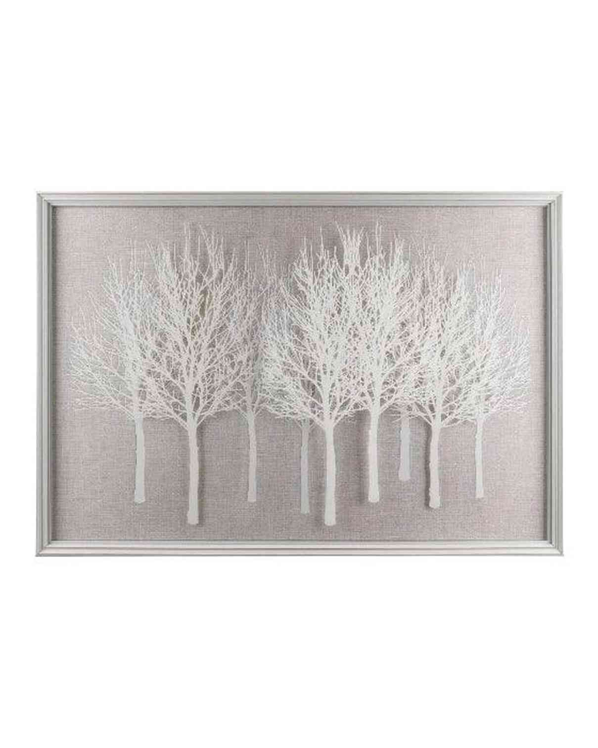Framed artwork of white trees on a textured gray background