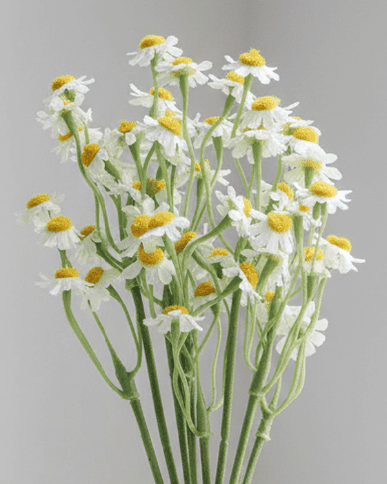 Artificial mini daisy flower bunch by Gisela Graham, realistic yellow and white daisy flowers in a compact arrangement.