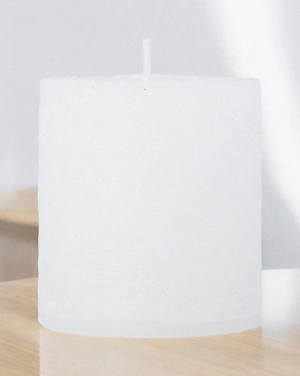 White wax pillar candle from Gisela Graham, showcasing a smooth, tall candle ideal for home decor and ambiance.