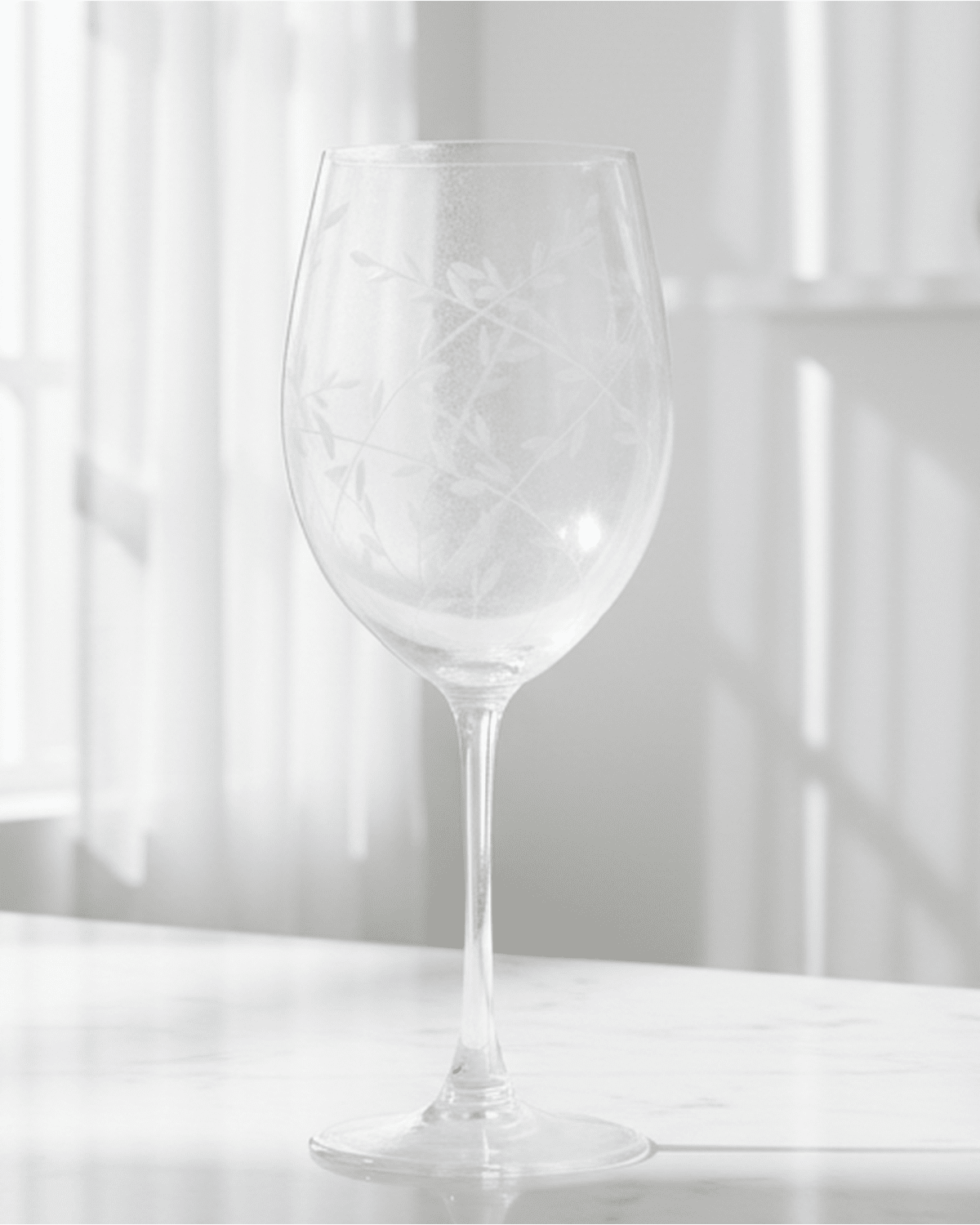 Clear wine glass with etched vine design by Gisela Graham, perfect for elegant kitchen and dining use.