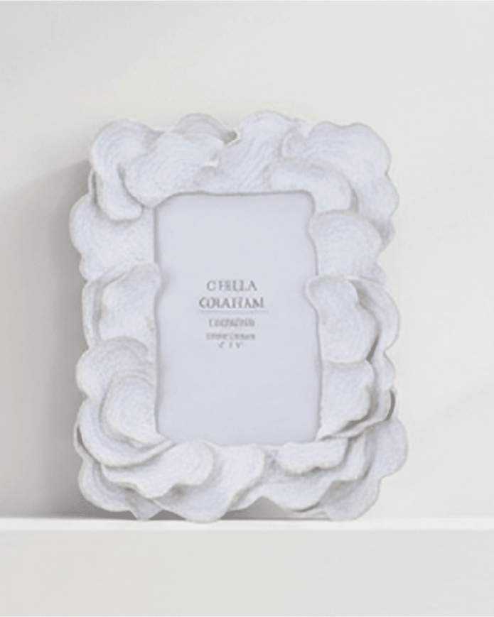 Whitewash oyster resin photo frame by Gisela Graham holding a 4x6cm picture, featuring a delicate anemone design.